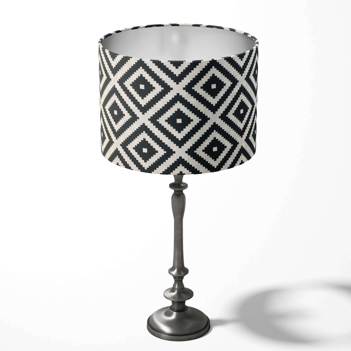 Black and white table lampshade with tribal aztec pattern on a white background.