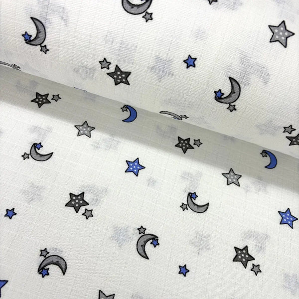 Grey and blue stars and moon celestial patterned 100% cotton muslin double gauze fabric for babies.