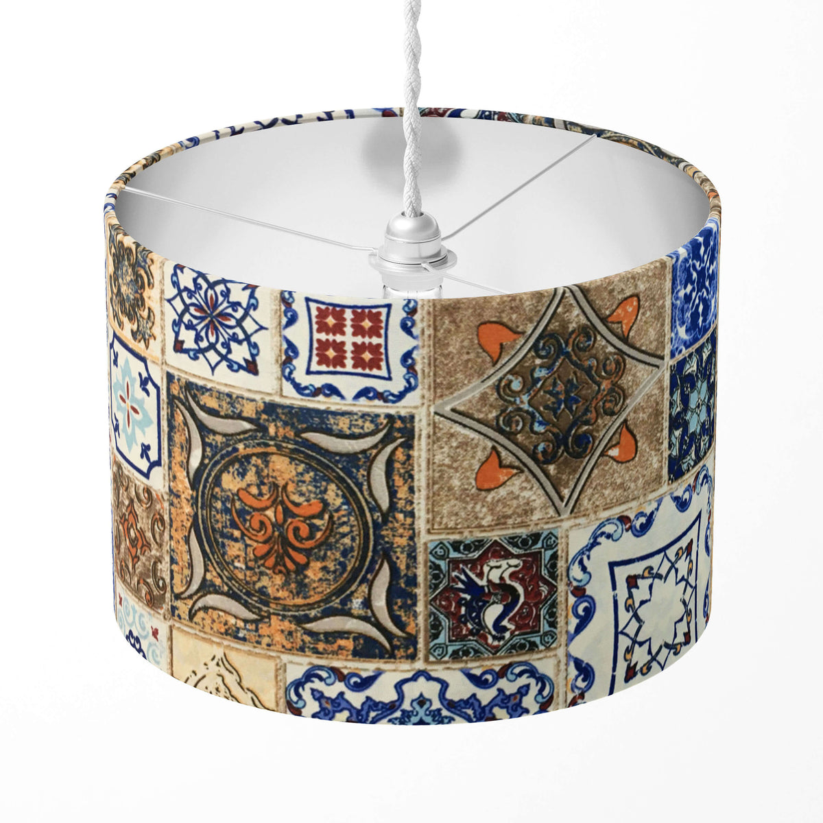 A moroccan tile lampshade with a geometric blue and brown pattern, designed for table lamps, ceiling pendants, or floor lamps.