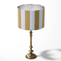 Mustard yellow and white large vertical stripe patterned table lampshade.