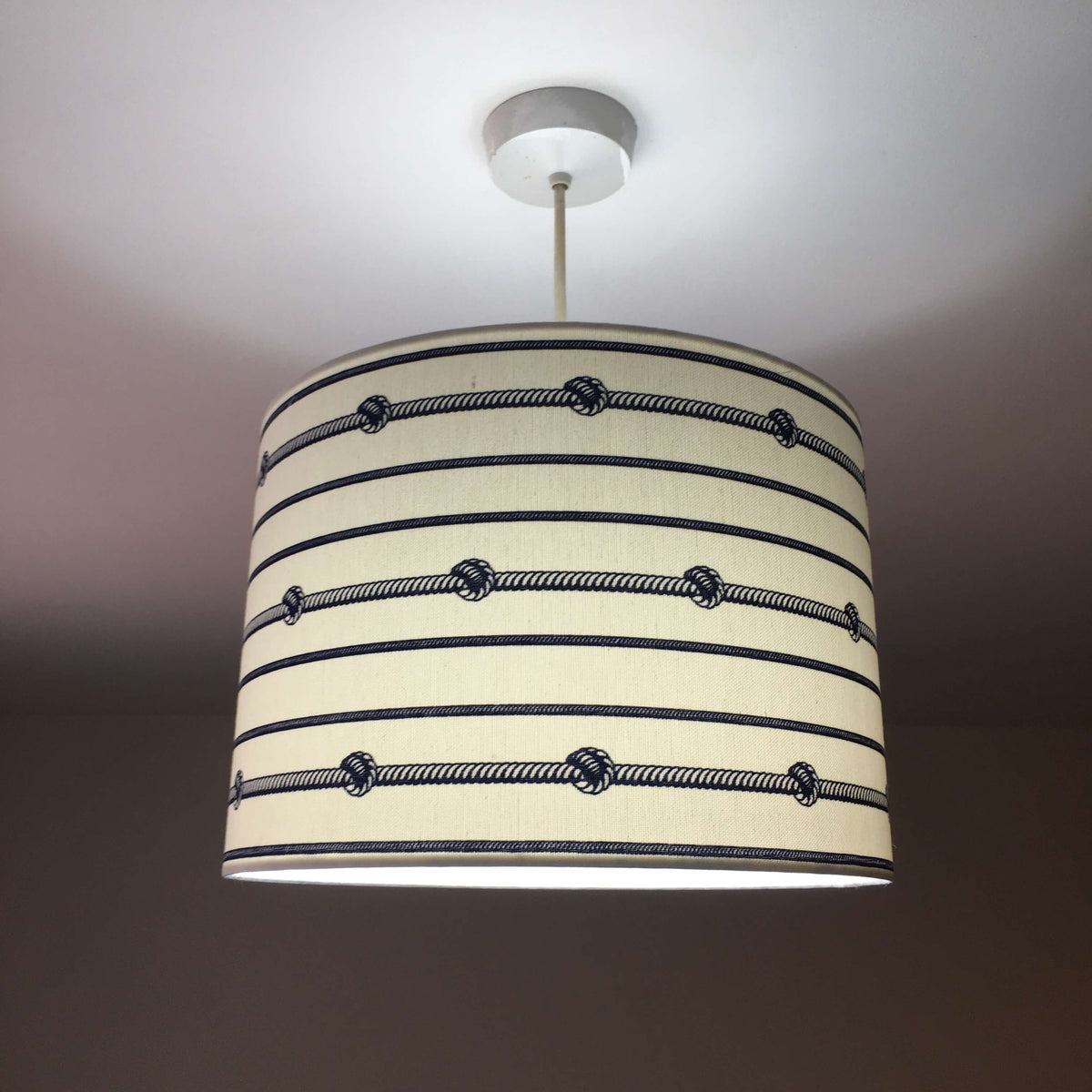 Navy blue and white horizontal striped lampshade for table lamps, floor lamps and ceiling pendants.