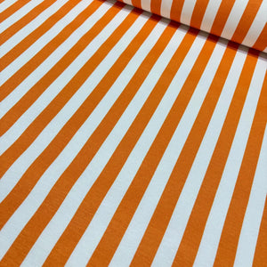 Bright orange and white thin stripe pattern cotton canvas upholstery fabric.