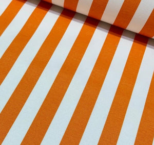 Close-up of orange and white striped fabric.