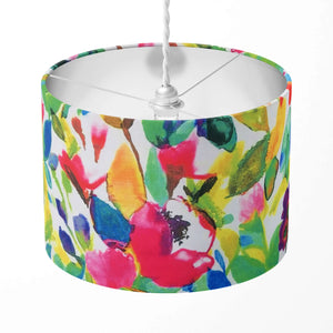 Colourful floral patterned lampshade on a white background.