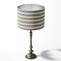 Table lampshade with teal green and white stripes on a white background.