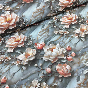 Peach floral upholstery curtain fabric on blue grey marble patterned background.