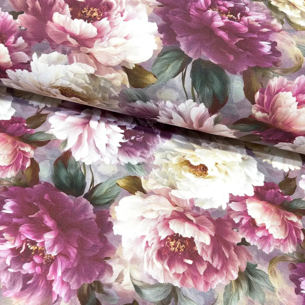 Blush pink and purple peony flower patterned cotton curtain upholstery fabric.