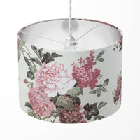 A pink floral patterned lampshade designed for table lamps, floor lamps, or ceiling pendants.