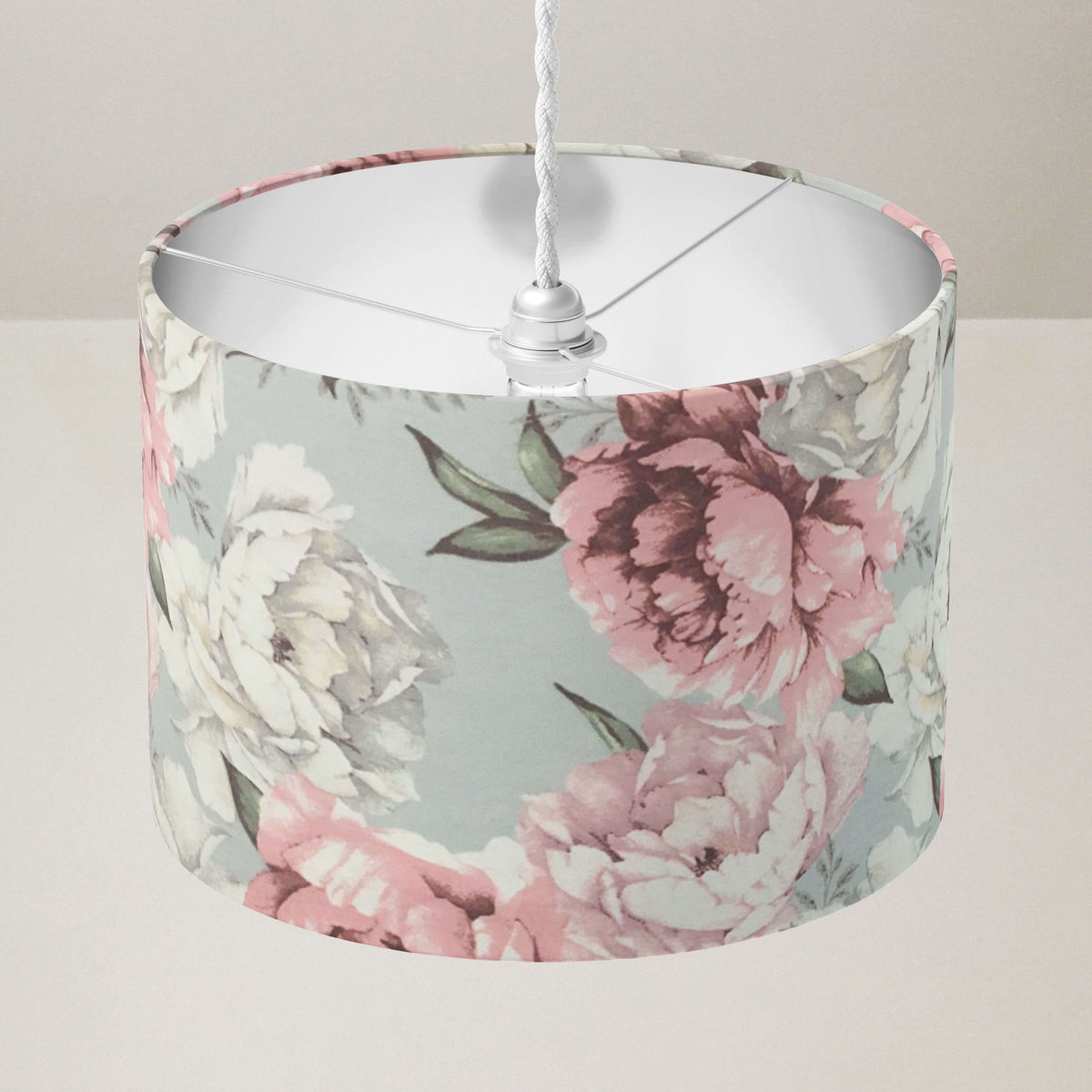 Floral patterned ceiling lampshade on a plain background.