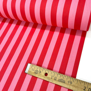 Pink red candy stripe patterned cotton poplin fabric.