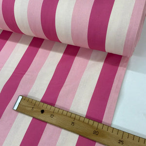 Pink stripe cotton fabric featuring wide hot pink, blush pink and white vertical cabana stripes.