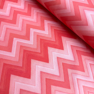 Coral pink red zig zag print upholstery curtain fabric.
