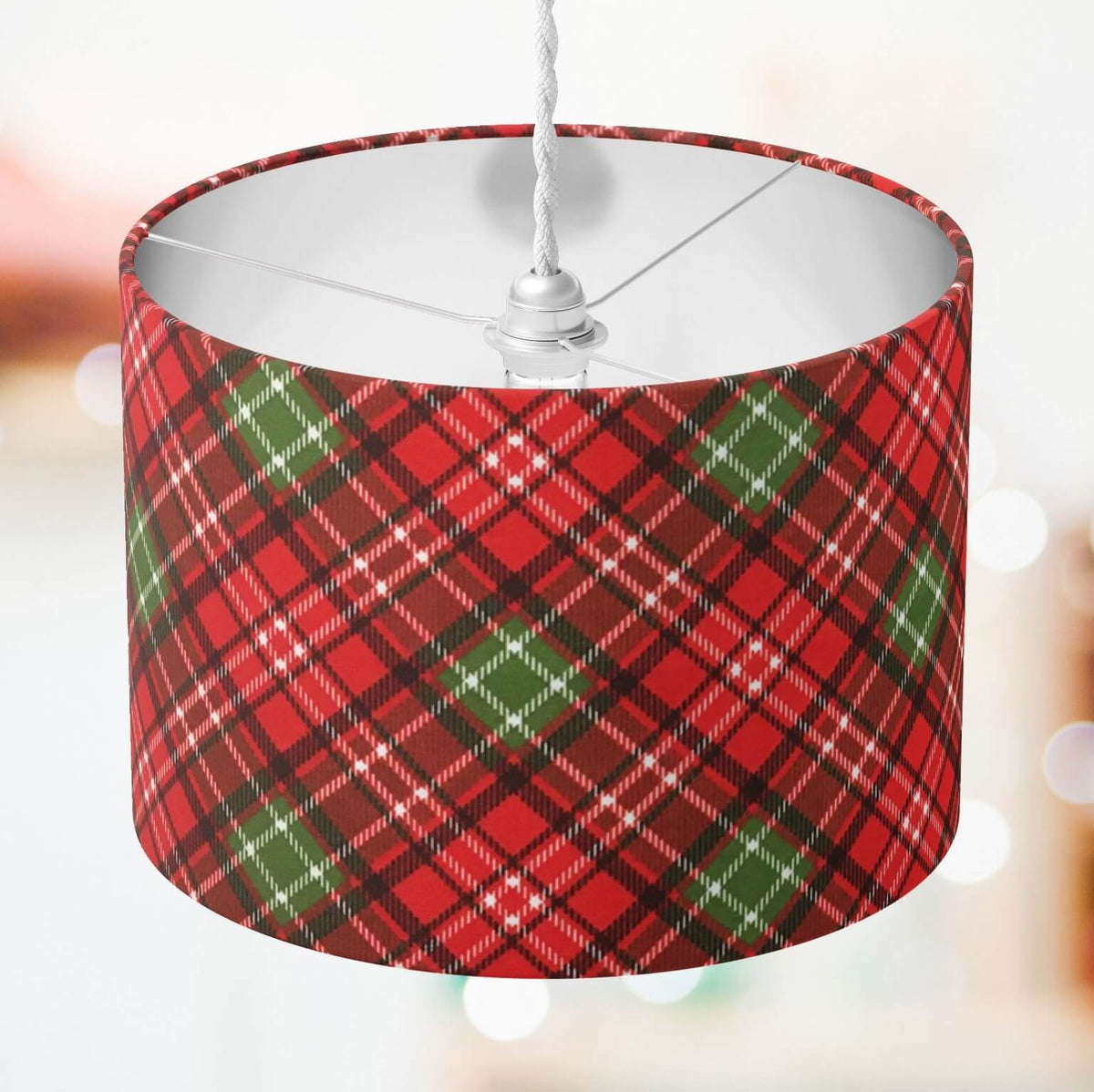Red and green scottish tartan check lampshade on a white background.