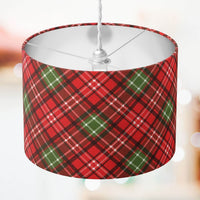 Red and green scottish tartan check lampshade on a white background.