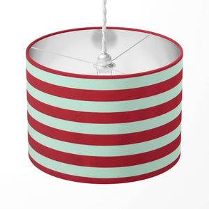 Striped lampshade with red and white horizontal stripes on a white background.