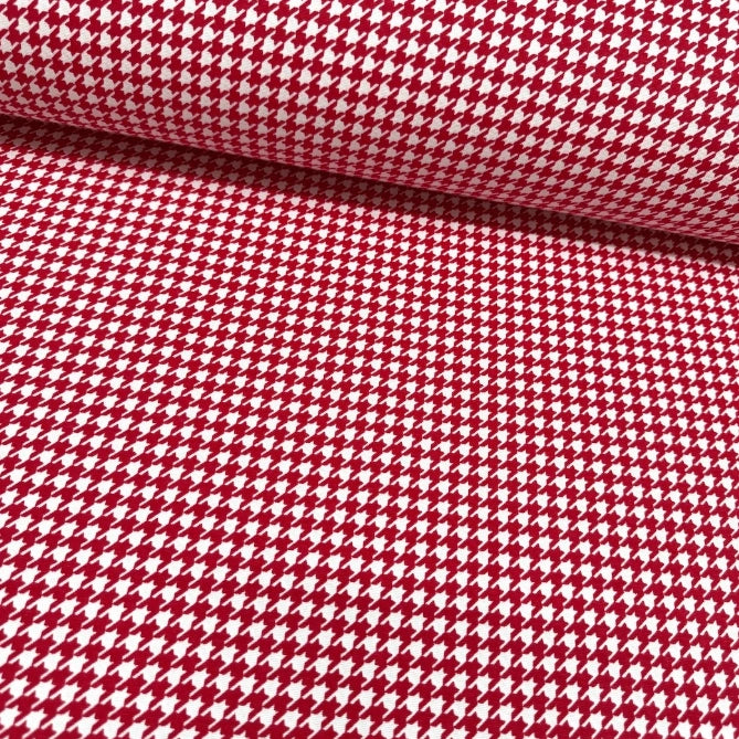 Bright red and white dogtooth pattern fabric for upholstery curtain and home decor.