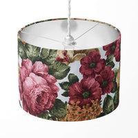 A burgundy red and moss green floral patterned lampshade designed for table lamps, floor lamps, or ceiling pendants.