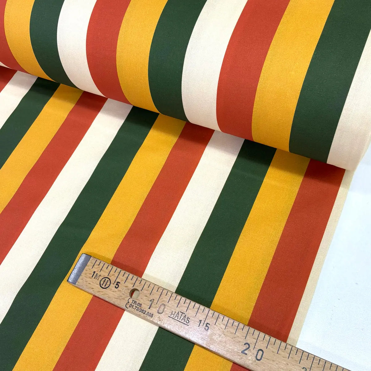 Shop retro large stripe cotton fabric in red, mustard, forest green and ivory. Premium 100% cotton fabric for dressmaking, quilting, patchwork, crafts and home décor.