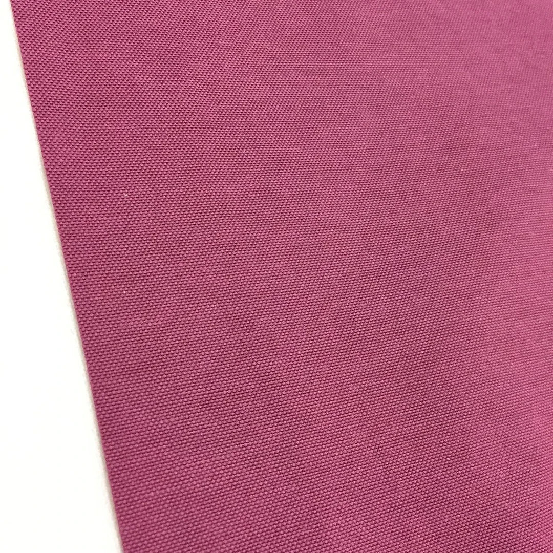 Rose pink cotton canvas fabric ideal for upholstery, curtains, indoor and outdoor cushions, furniture and sewing projects.