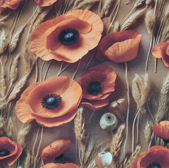 Wildflower orange poppies and gold wheats patterned cotton canvas upholstery fabric.