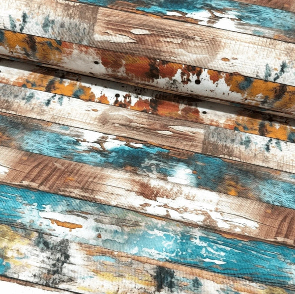 Rustic marbled wood grain upholstery fabric in brown, teal blue, orange and white colours.