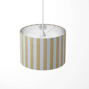 A yellow and white thin vertical striped ceiling pendant lampshade.