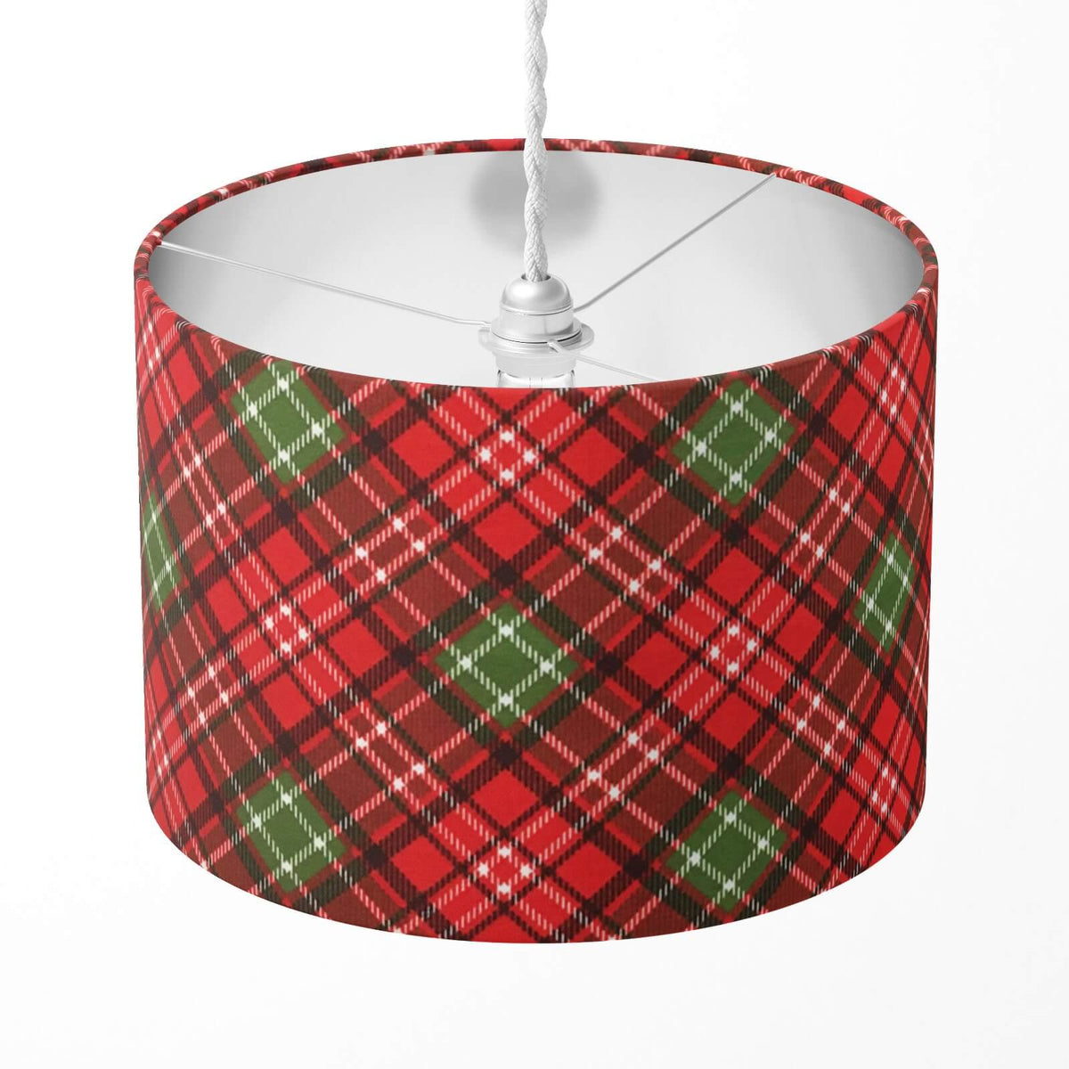Red and green plaid lampshade on a white background.