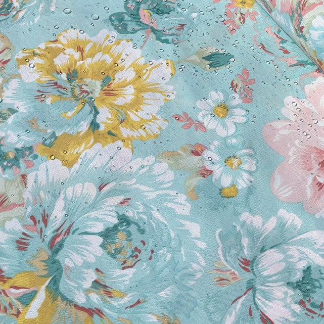 Water repellent mint green yellow pink large floral fabric.