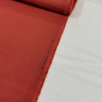 Terracotta upholstery fabric in a rust orange woven finish, ideal for upholstery, curtains, cushions, soft furnishings and home décor projects.