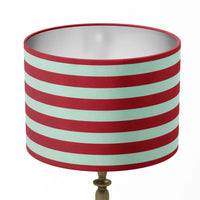 Contemporary striped lampshade with red and white horizontal stripes on a white background.
