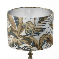 Brown and blue jungle leaf patterned lampshade on a white background.