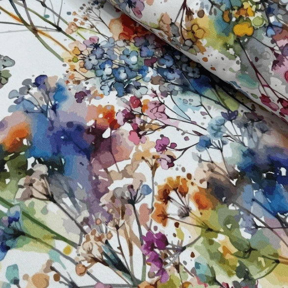 Watercolour floral leaf print  upholstery curtain fabric in red blue green yellow brown and white.
