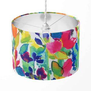 Watercolour floral lampshade with pink blue green yellow flowers and leaves.