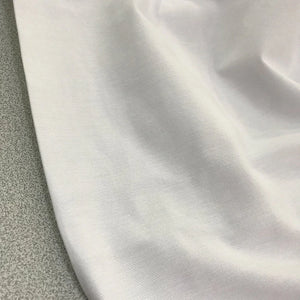 White plain cotton canvas fabric ideal for upholstery, curtains, cushion covers, chairs, bags and home décor projects.