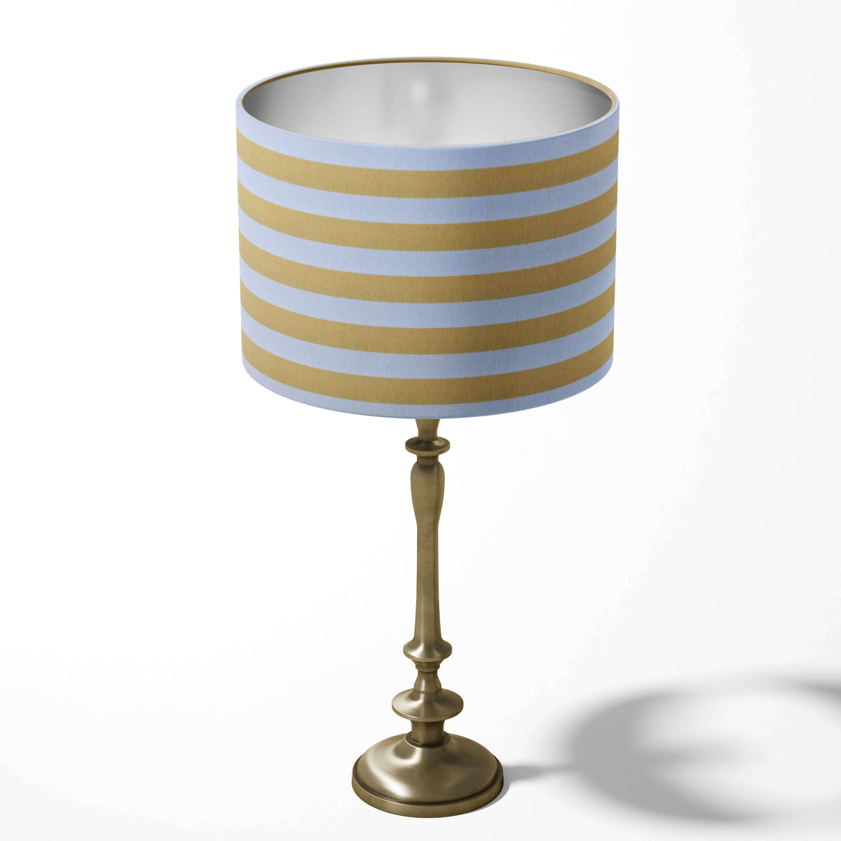 Table lampshade with a lemon yellow and white stripe pattern on a white background.