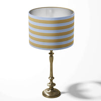 Table lampshade with a lemon yellow and white stripe pattern on a white background.