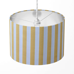 A yellow and white vertical striped lampshade designed for table lamps, floor lamps, or ceiling pendants. 