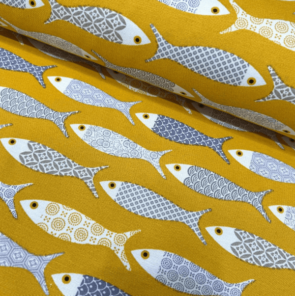 Fish patterned fabric in mustard yellow grey and white colours  for upholstery curtain  and home decor crafts.