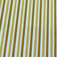 Close-up of cotton canvas upholstery fabric with mustard yellow and white striped pattern.