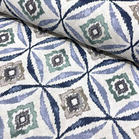 Blue and green moroccan ikat upholstery fabric.