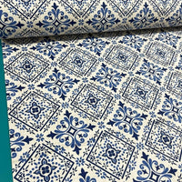 Blue and white spaish tile print upholstery curtain fabric.