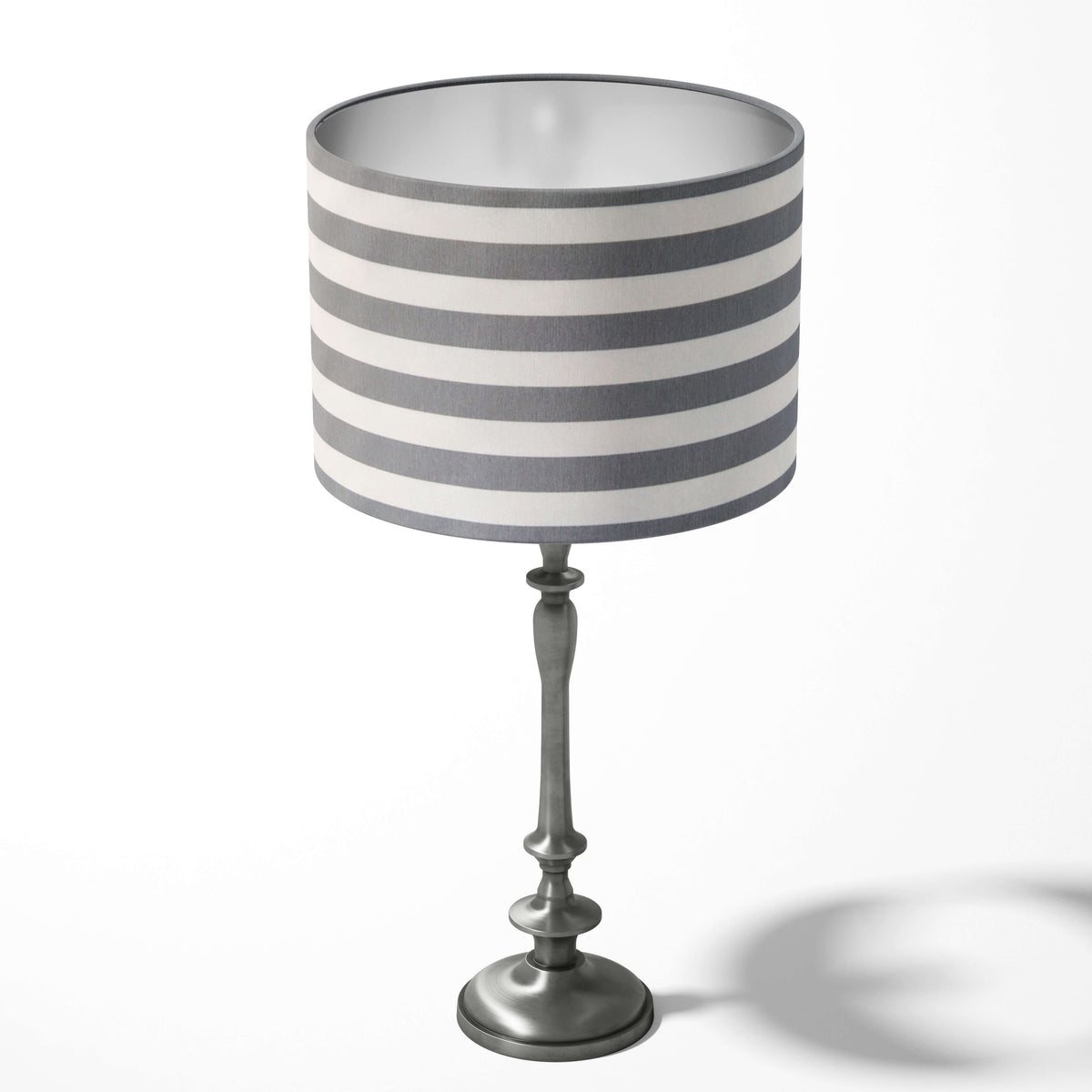 Table drum lampshade with a grey and white stripe pattern.
