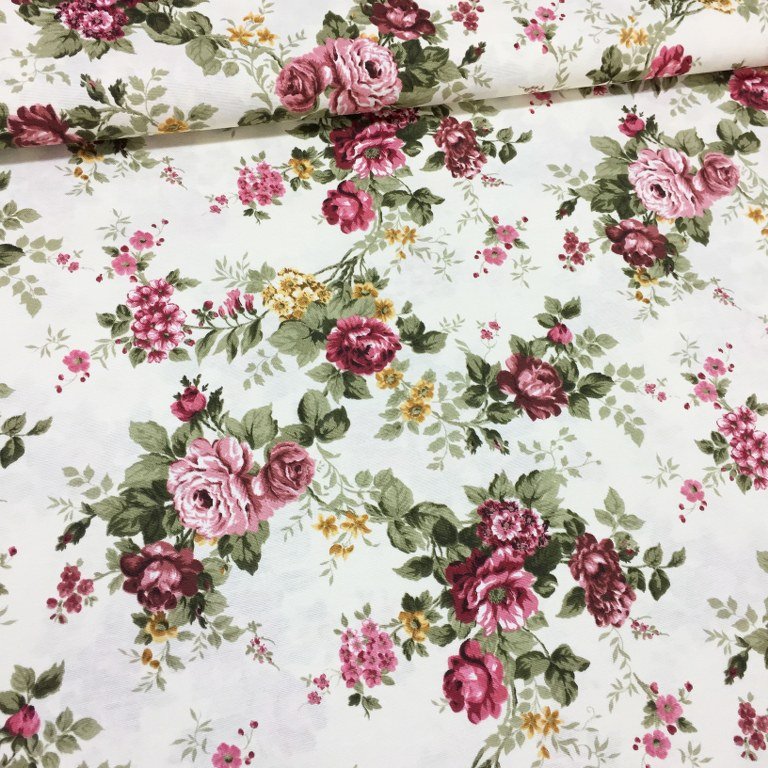 Curtain upholstery fabric printed with burgundy maroon pink roses and green leaves on white background.