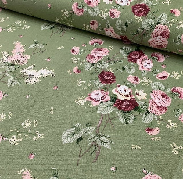 Shabby chic pink and maroon floral patterned olive green upholstery, curtain and home decor fabric.