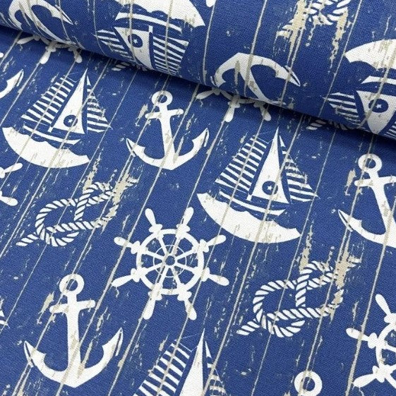 Nautical maritime upholstery curtain fabric in indigo blue and white.