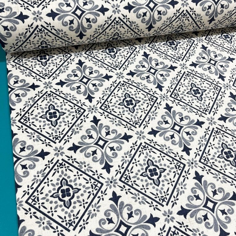 Geometric moroccan ethnic patterned upholstery curtain fabric in grey and white.