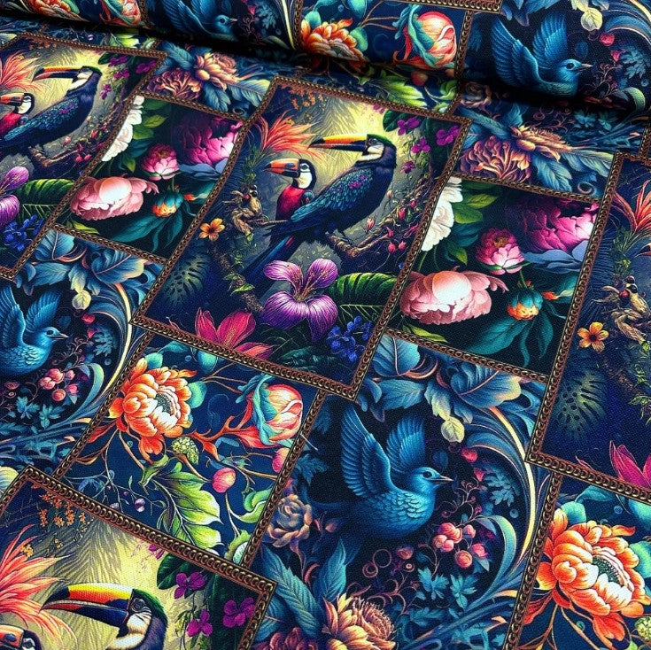 Painting upholstery curtain fabric patterned with exotic birds, flowers in red, blue, green, yellow, purple, navy and black.