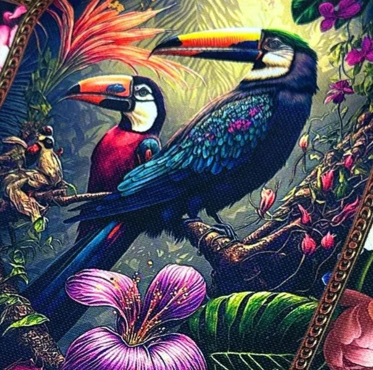 Exotic jungle bird and floral print upholstery fabric in navy blue, red, yellow, green and purple.