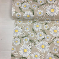 Shabby chic yellow white daisy flower upholstery fabric on beige background.
