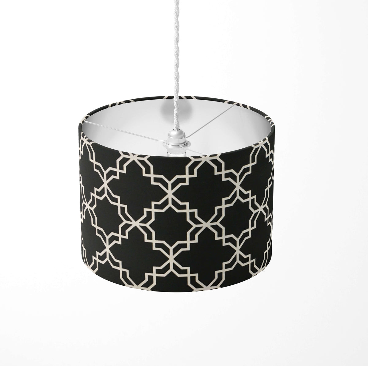 Black and white moroccan ceiling lampshade on a white background.
